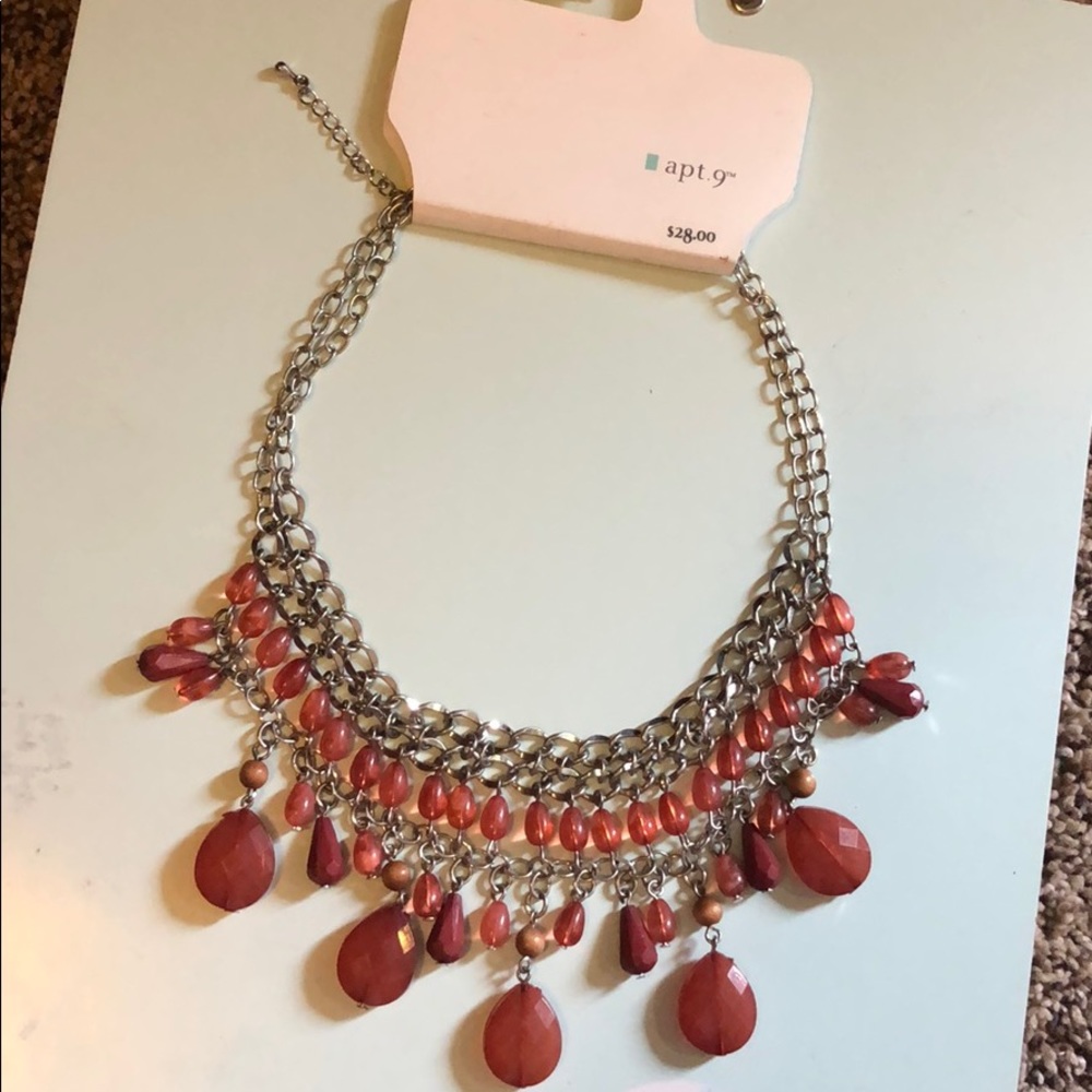red and silver necklace